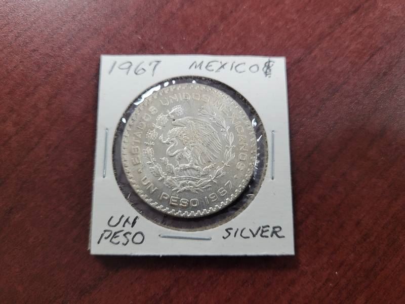 Biddergy - Worldwide Online Auction and Liquidation Services - 1967 BU  Mexico Silver Dollar UN Peso